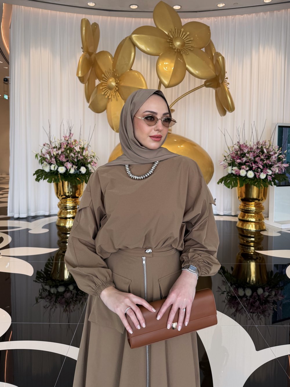 طقم نسائي عصري 2 قطع تونيك + تنورة قماش باراشوت خفيف وعملي