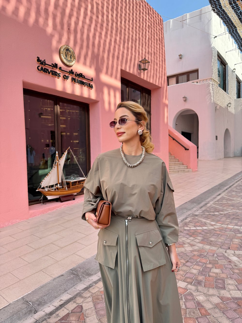 طقم نسائي عصري 2 قطع تونيك + تنورة قماش باراشوت خفيف وعملي