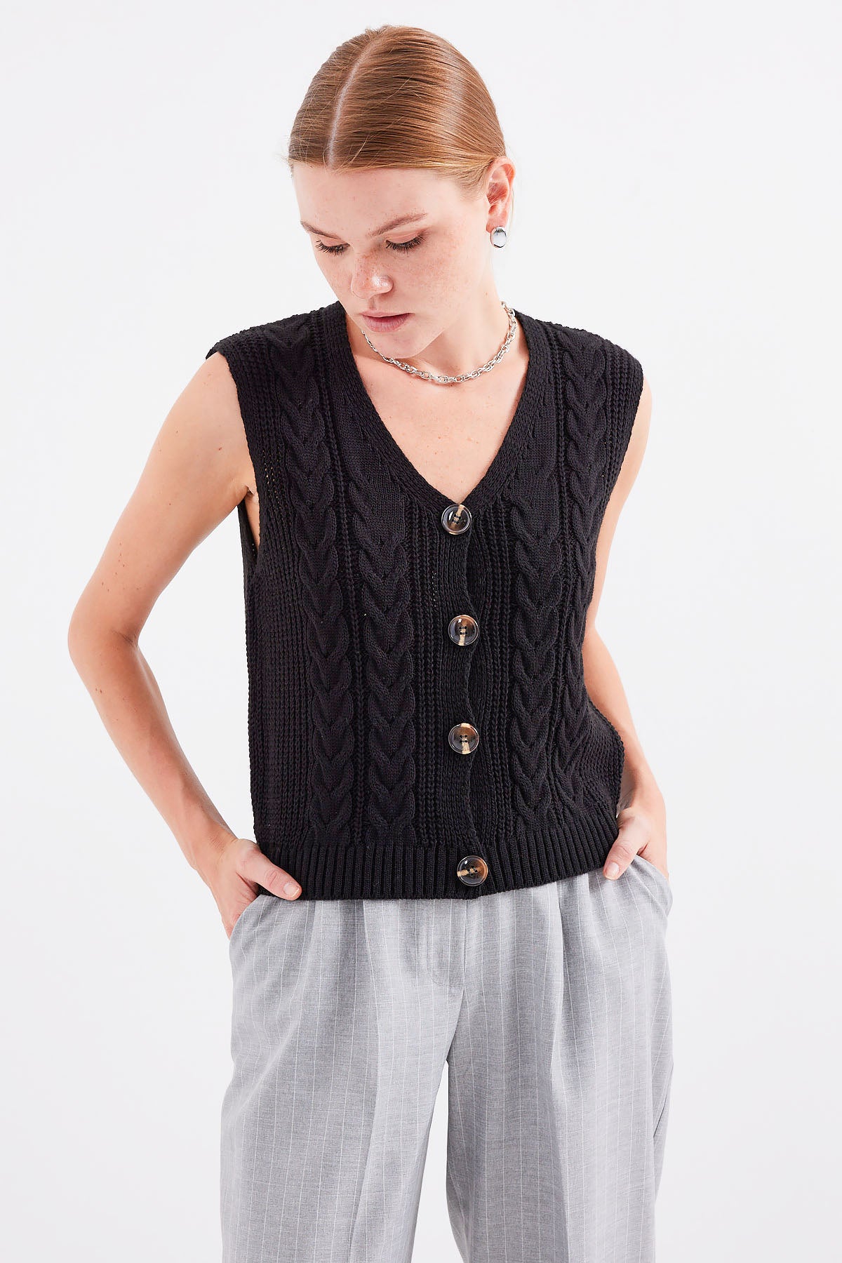 <tc>Gilet en tricot à boutons court 15882.</tc>