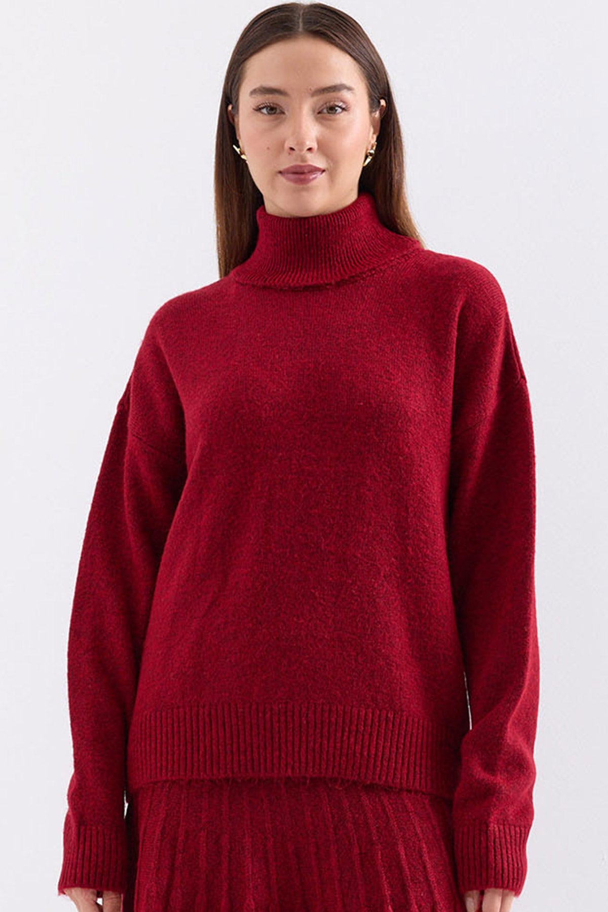 <tc>15917 pull oversize en maille pour femme à col roulé.</tc>