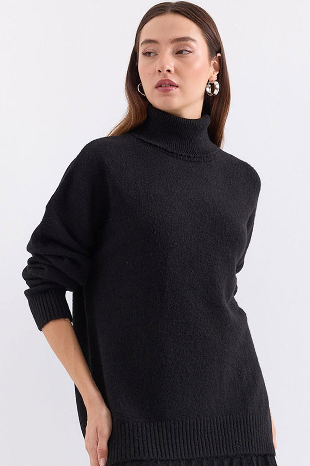 <tc>15917 pull oversize en maille pour femme à col roulé.</tc>