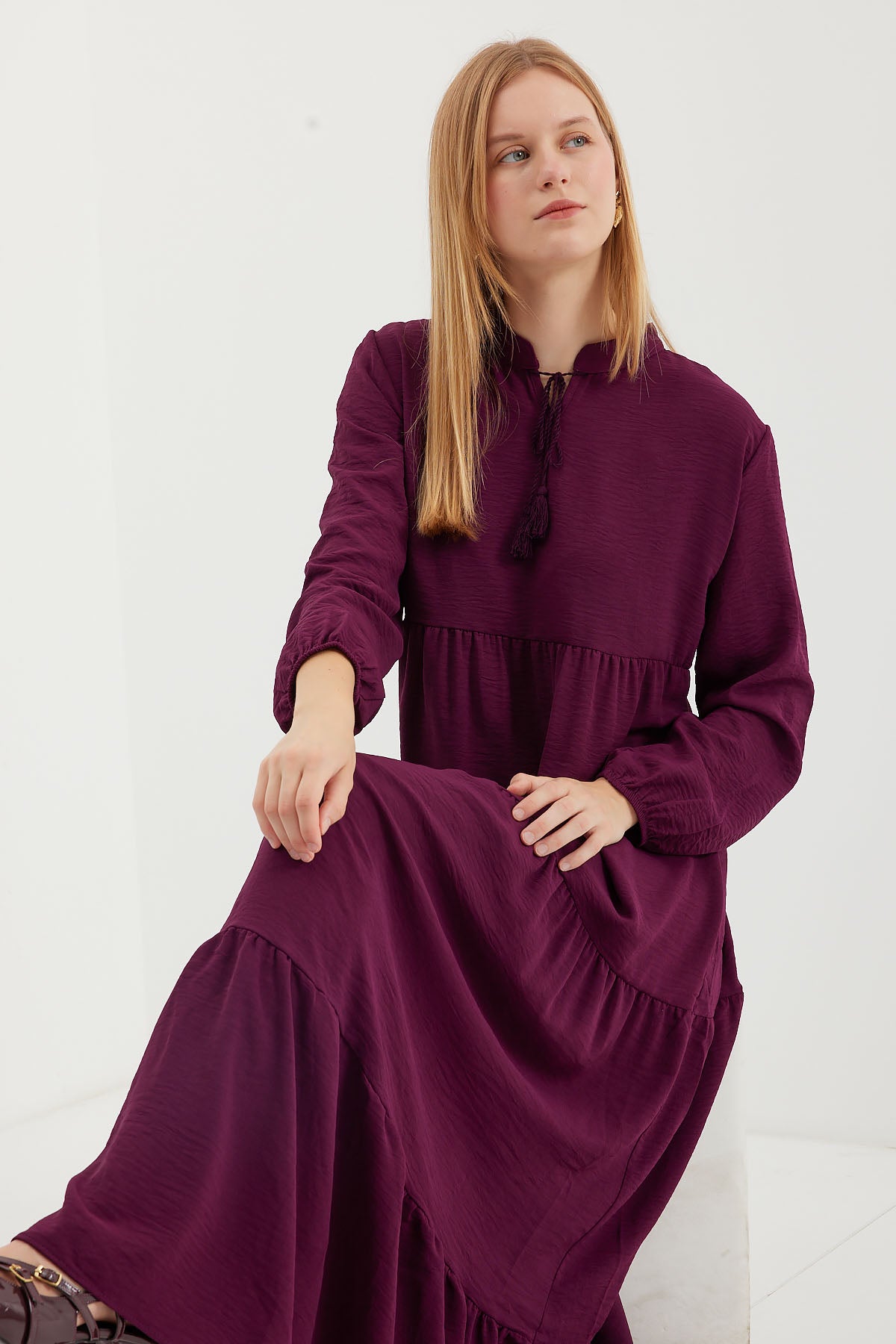 <tc>Robe de modestie avec lien au cou 1627.</tc>