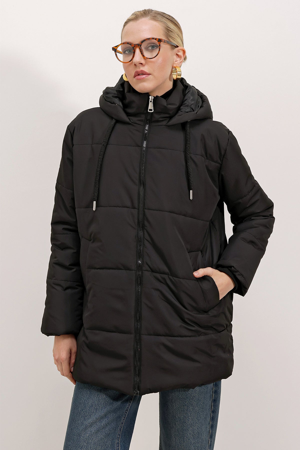 <tc>manteau en duvet oversize avec capuche</tc>