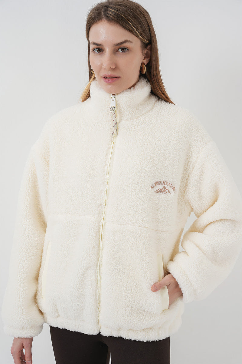 Veste en peluche à fermeture éclair pour femme