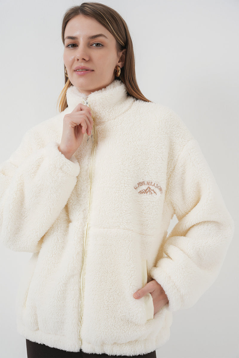Veste en peluche à fermeture éclair pour femme