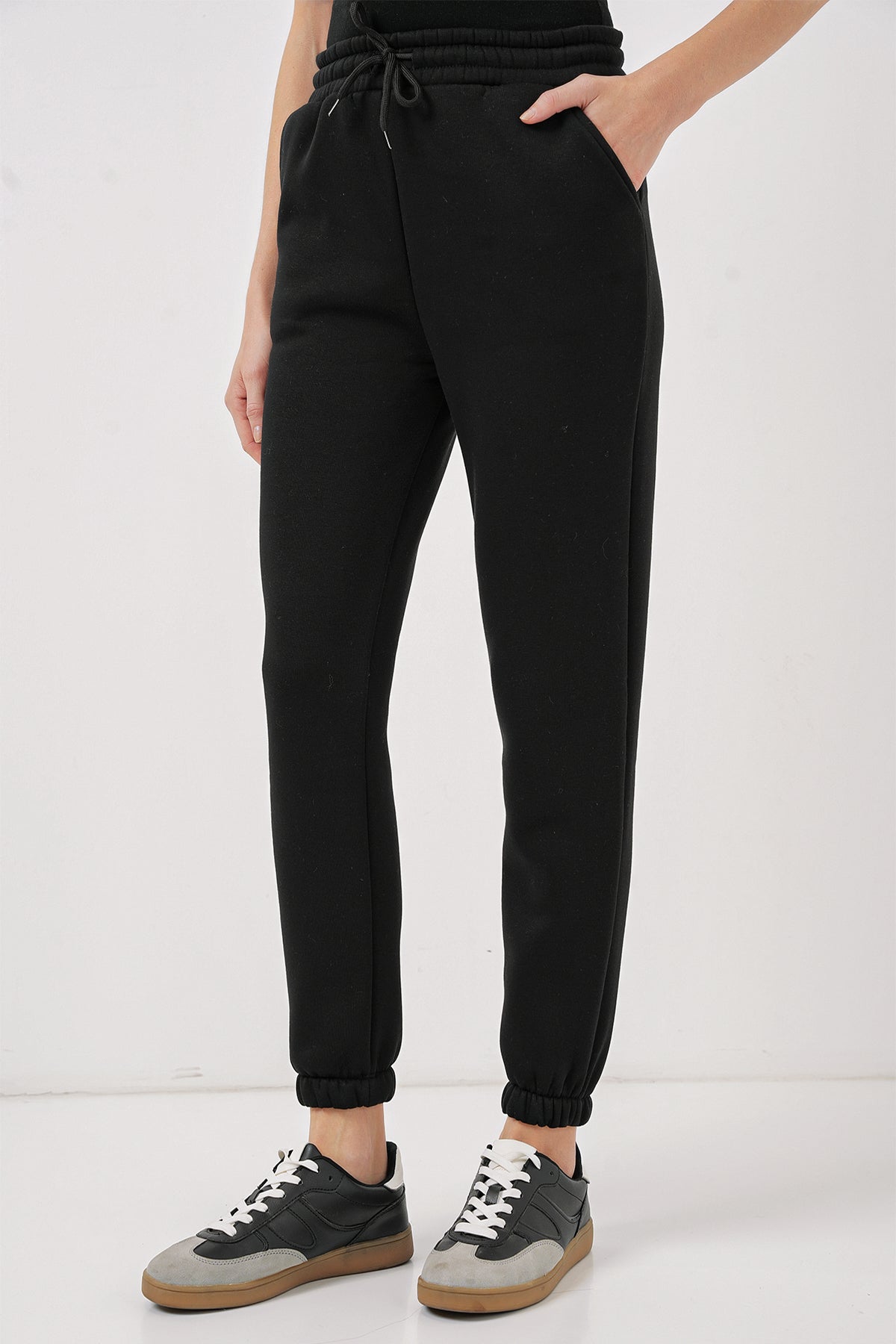 <tc>Pantalon de survêtement 55450 en trois fils</tc>