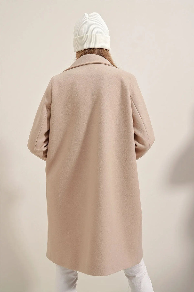 <tc>جاكيت نسائي طويل - كلاسيكي ساده  </tc>