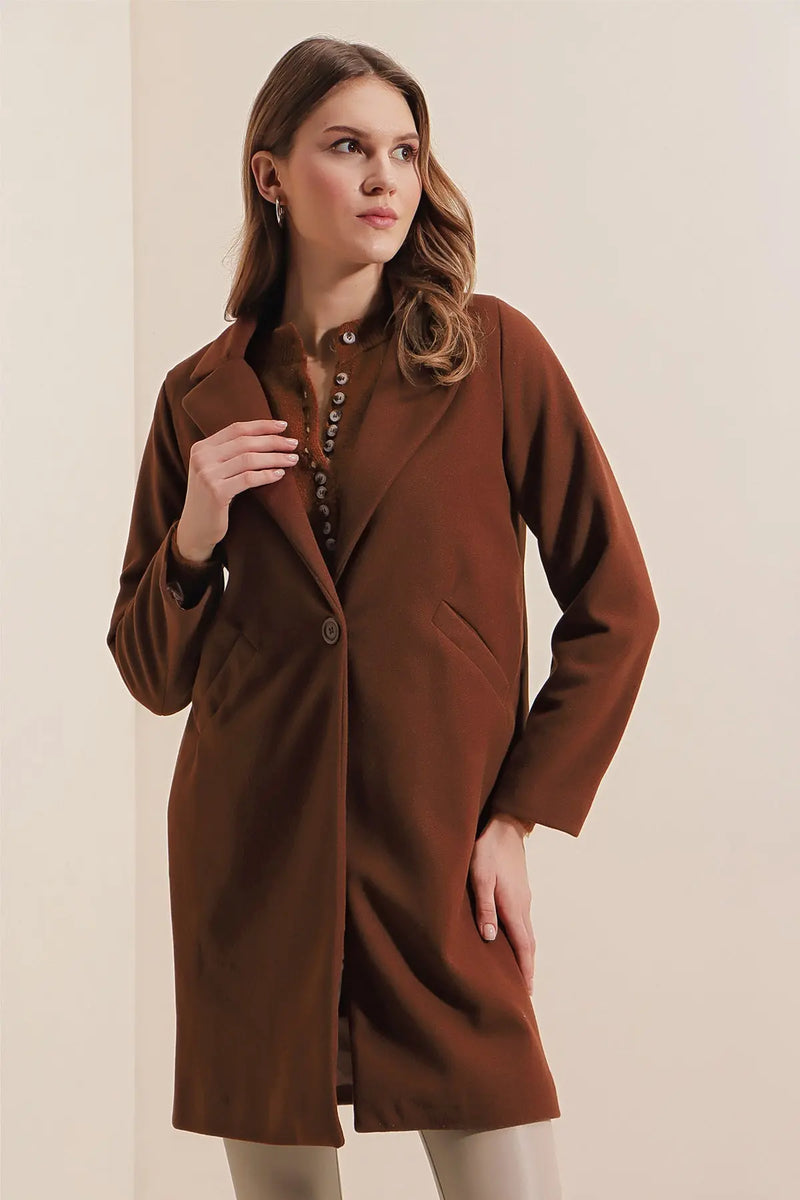 <tc>جاكيت نسائي طويل - كلاسيكي ساده  </tc>