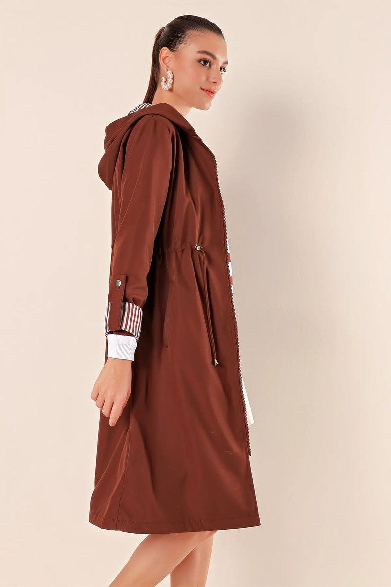 <tc>جاكيت نسائي طويل بسحاب أمامي - مزود بغطاء للراس - ببطانه مخططه</tc>