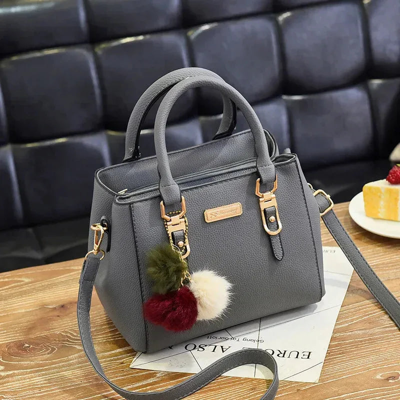 Sac à Main Femme avec Perles et Pompon – Sac à Bandoulière Femme Embossé, Sac Messenger Élégant - Justyol
