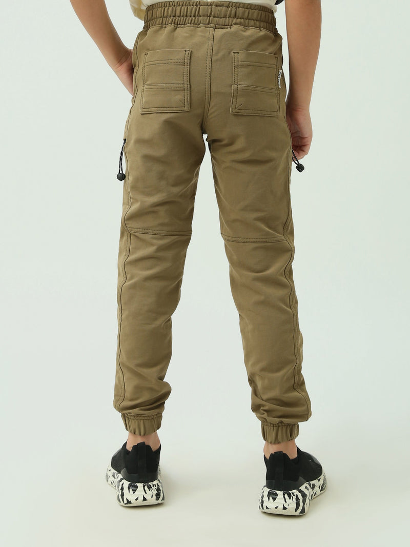 Pantalon de sport garçon à taille élastique avec poches latérales au design confortable - JOG23WGPS24242TB1