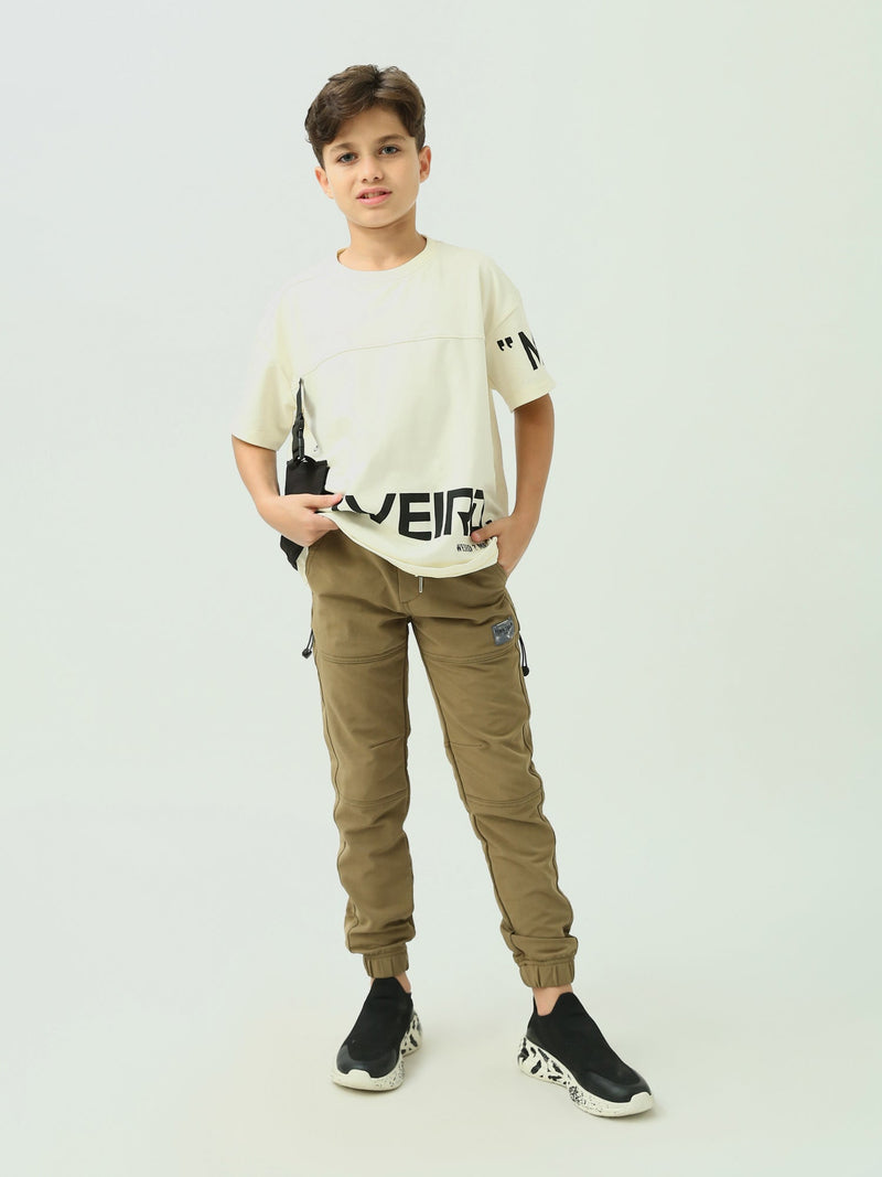 Pantalon de sport garçon à taille élastique avec poches latérales au design confortable - JOG23WGPS24242TB1