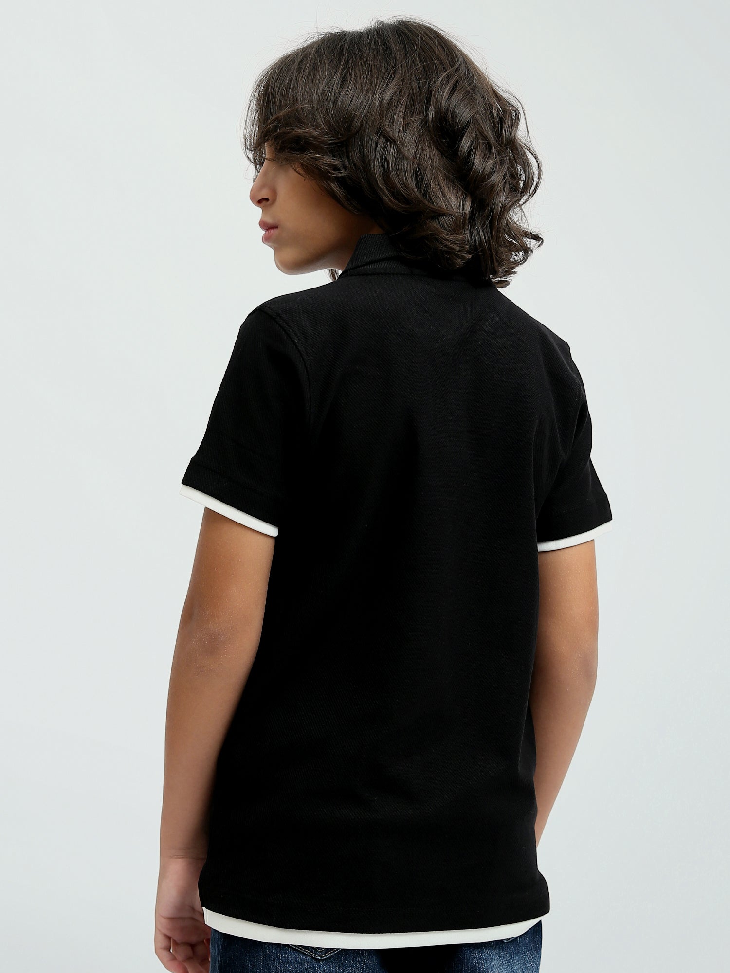 Polo enfant au design moderne avec boutons distinctifs – POS24SBTR21813TB1