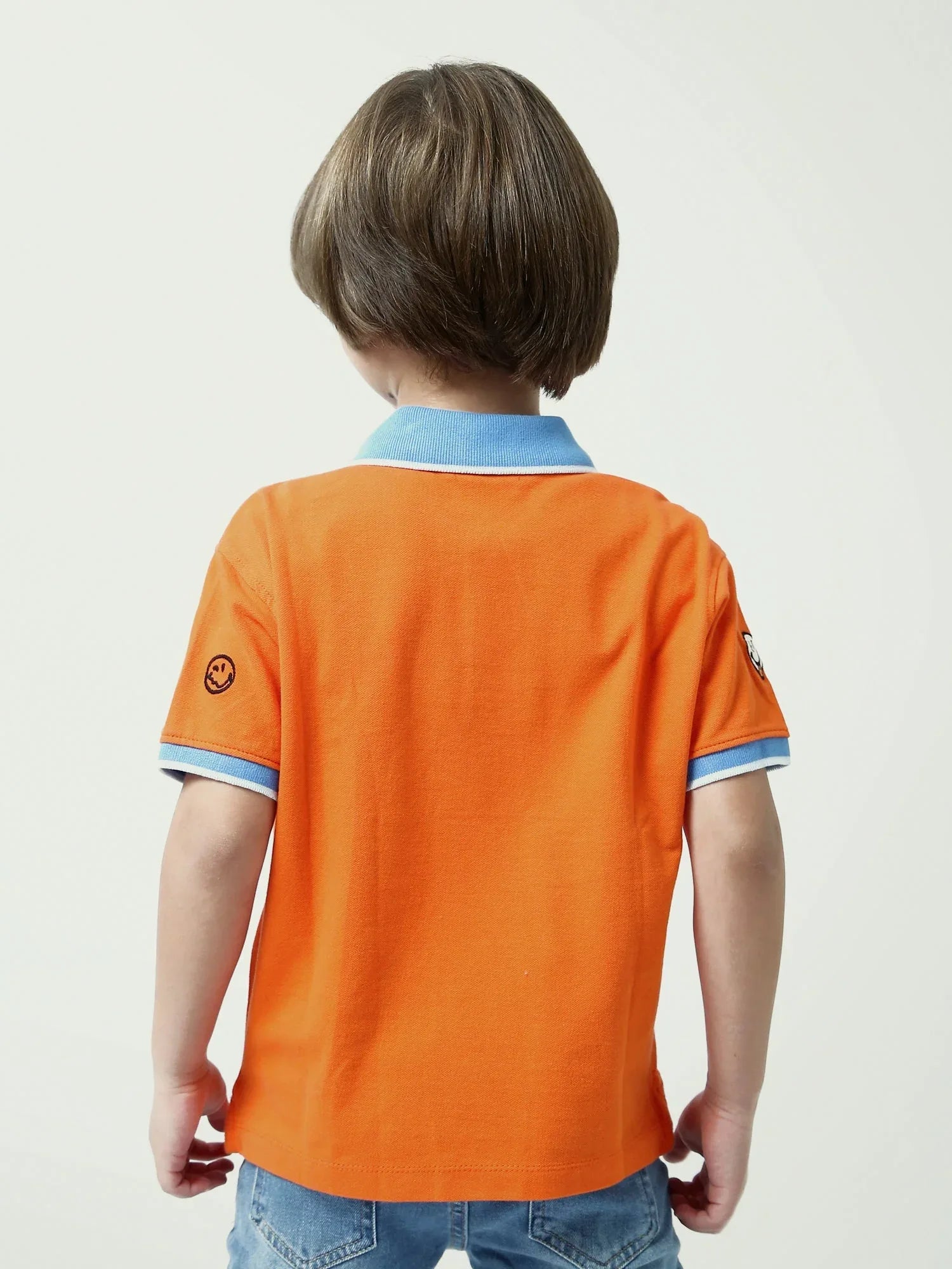 Polo garçon Smiley manches courtes, col contrasté bleu, style fun - POS24SEPI75382MB1 - Justyol