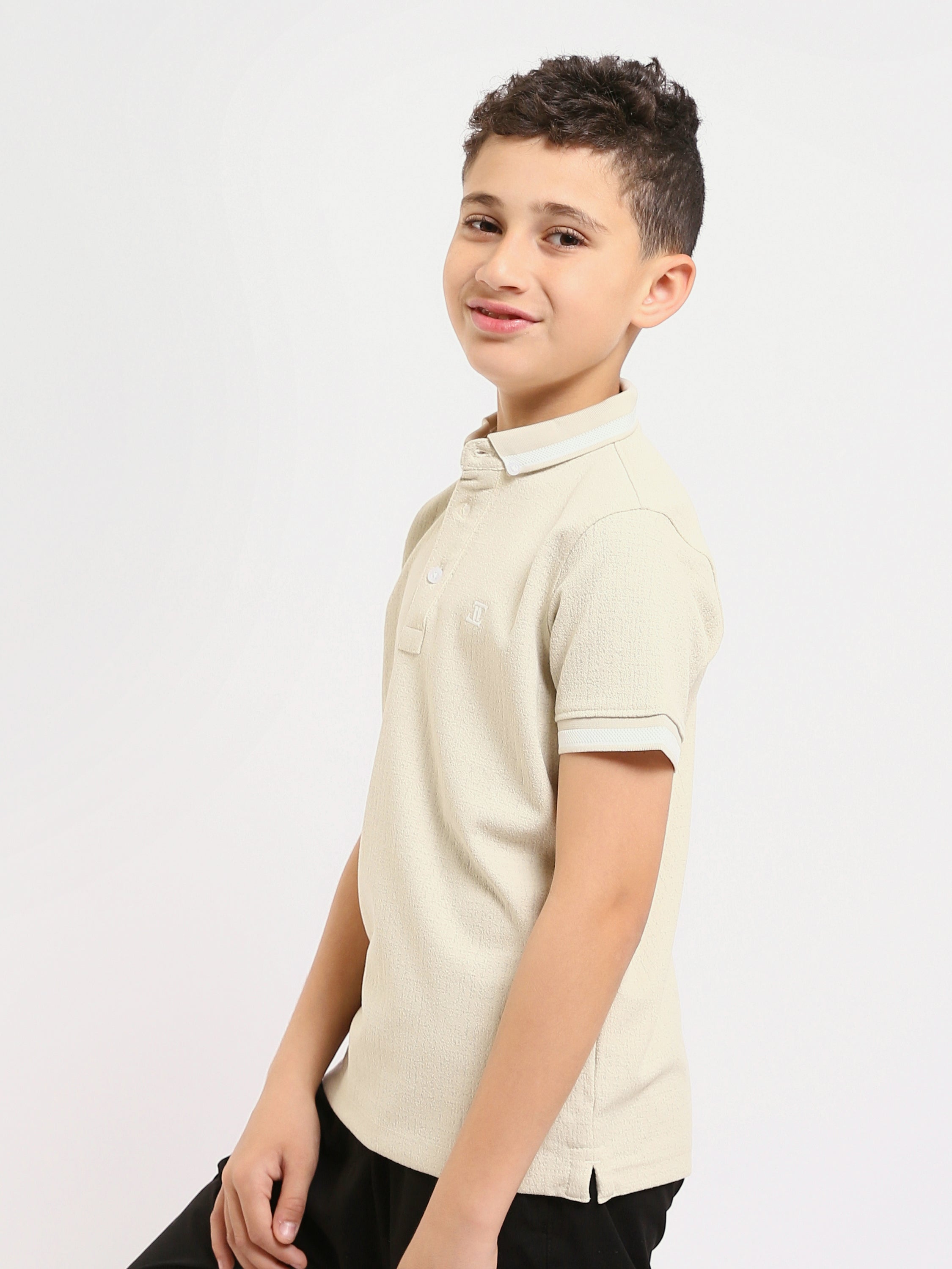 Polo enfant au design moderne et à la couleur douce – POS24SNTR21762TB1