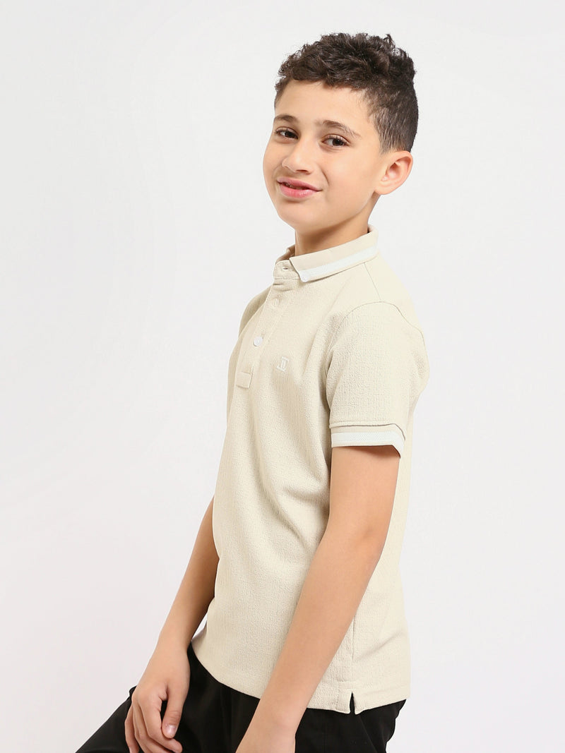 Polo enfant au design moderne et à la couleur douce – POS24SNTR21762TB1