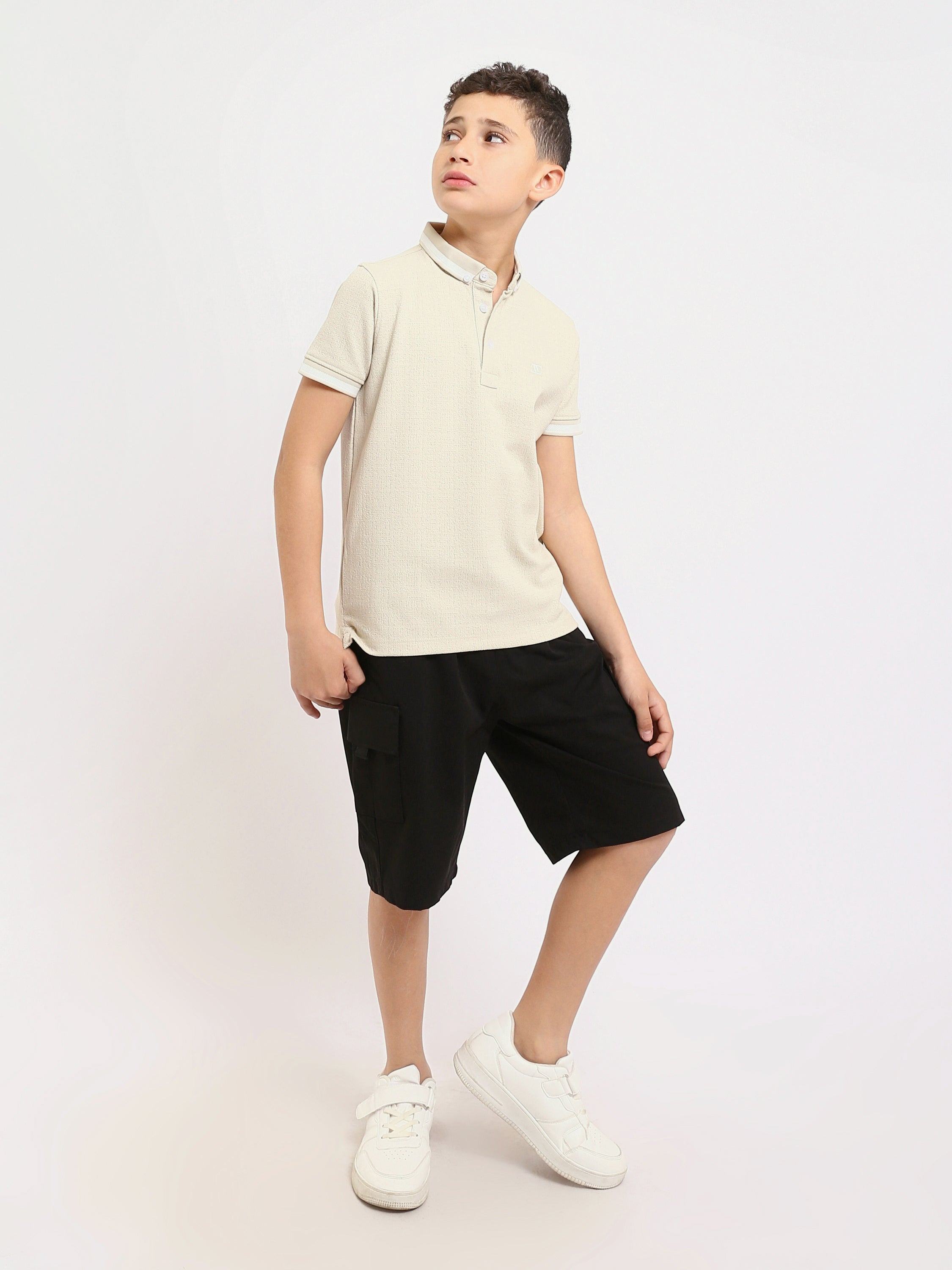 Polo enfant au design moderne et à la couleur douce – POS24SNTR21762TB1