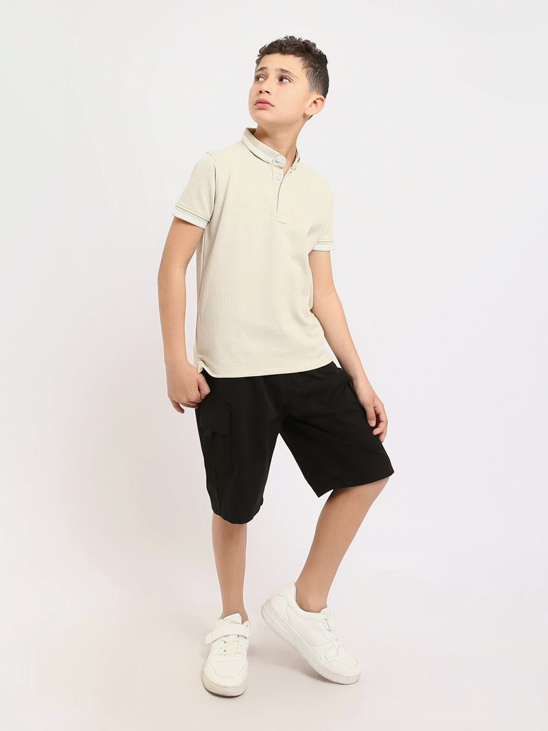 Polo enfant au design moderne et à la couleur douce – POS24SNTR21762TB1