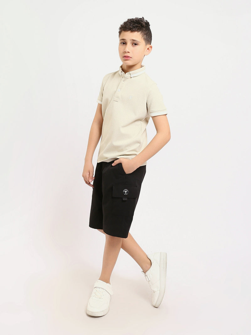 Polo enfant au design moderne et à la couleur douce – POS24SNTR21762TB1