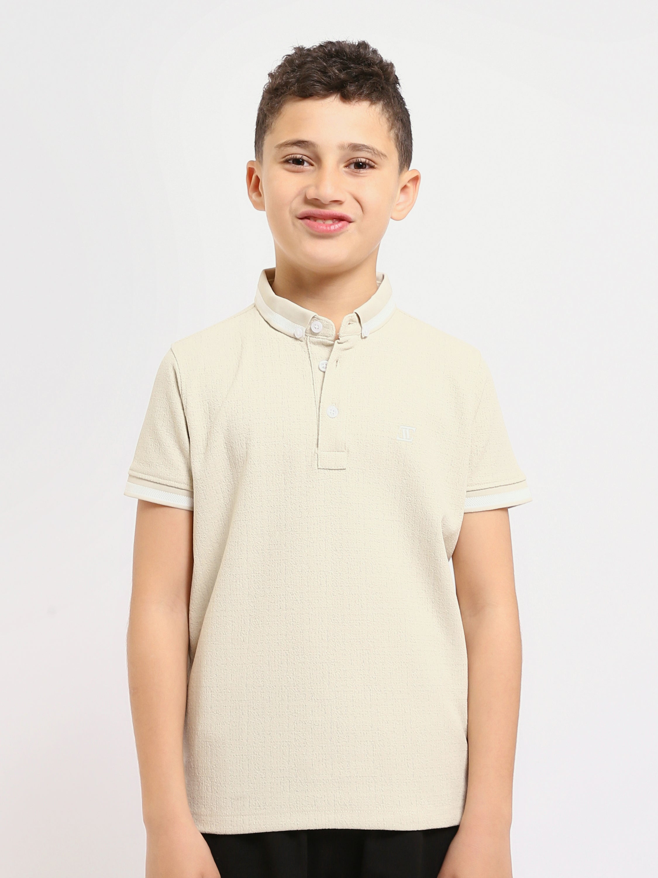 Polo enfant au design moderne et à la couleur douce – POS24SNTR21762TB1