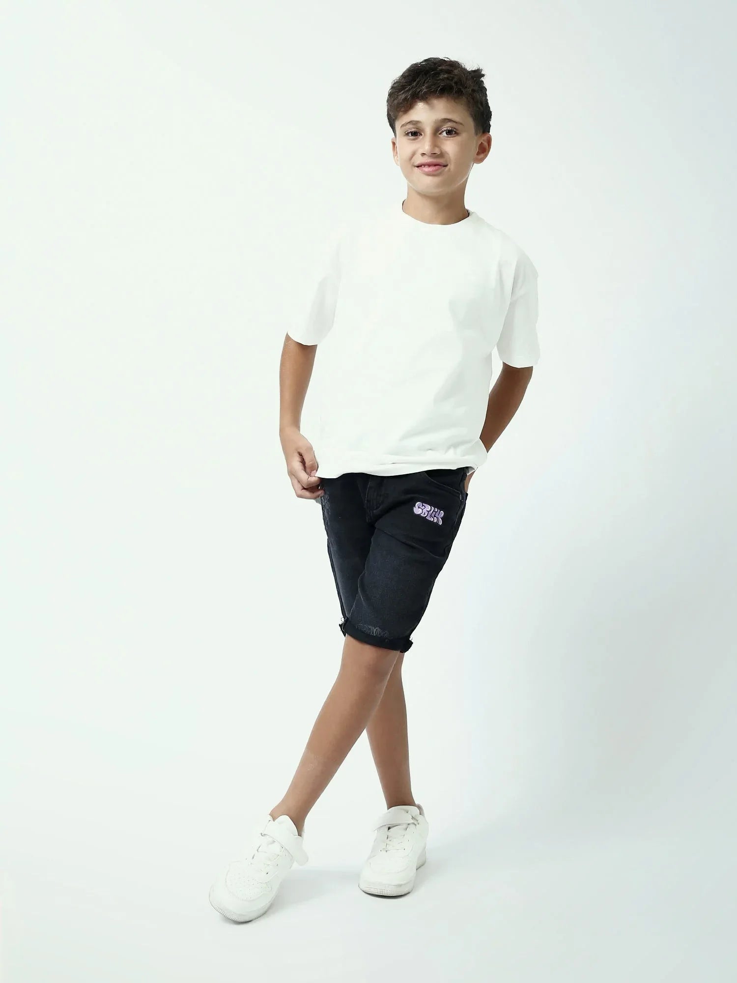 Short jean ado garçon noir avec revers et détails imprimés - SHR24SDPP75421MJ1 - Justyol