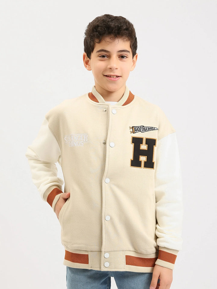 Veste teddy garçon ado à boutons-pression, style varsity, patchs “H” et finitions contrastées - SWS25WBNS76026MJ1