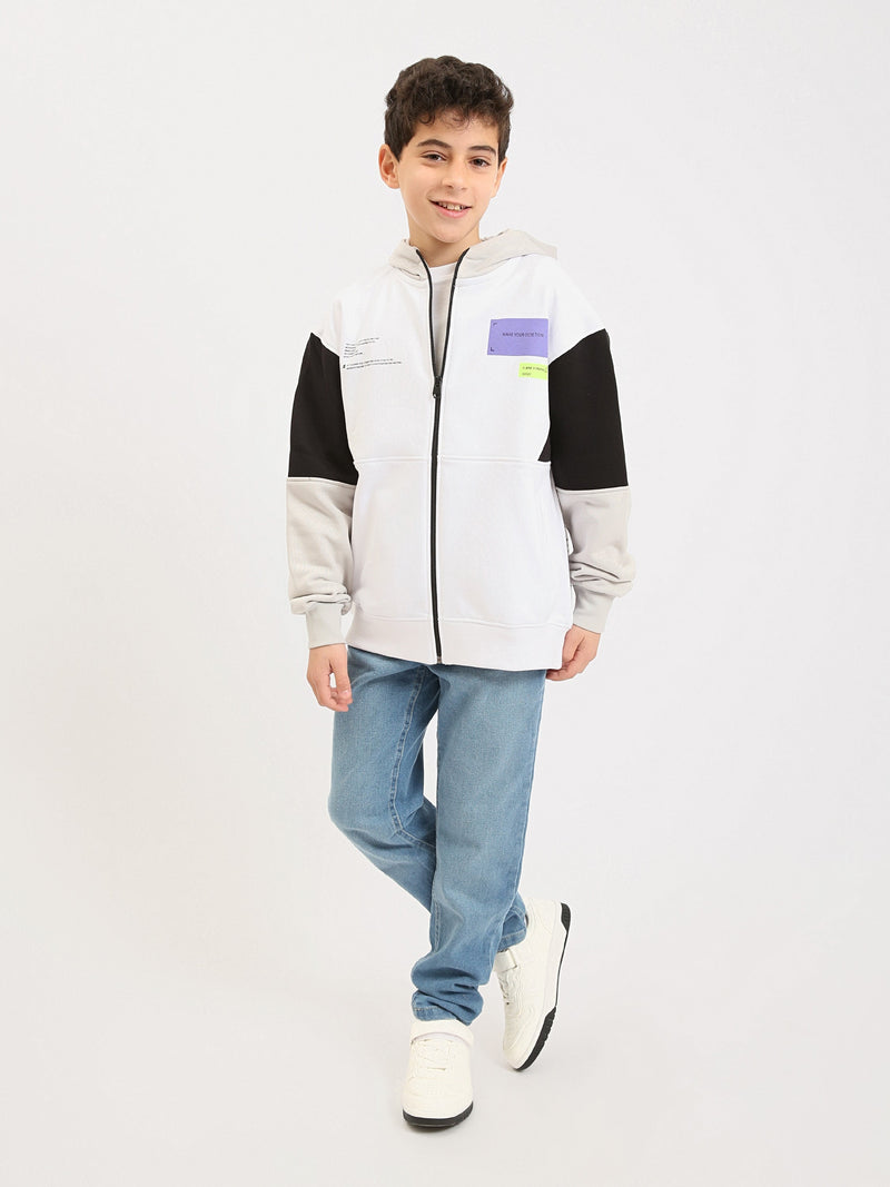 Sweat à capuche zippé garçon ado, bicolore blanc avec manches contrastées, poches et badges - SWS25WHNK76025MJ1