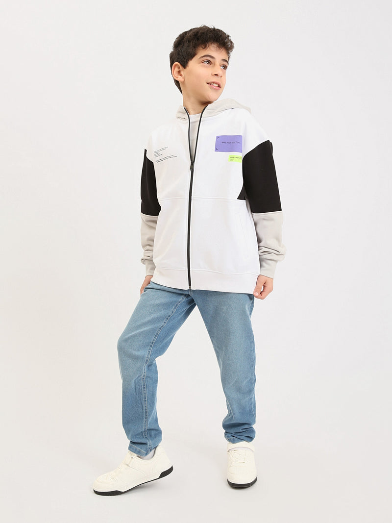 Sweat à capuche zippé garçon ado, bicolore blanc avec manches contrastées, poches et badges - SWS25WHNK76025MJ1