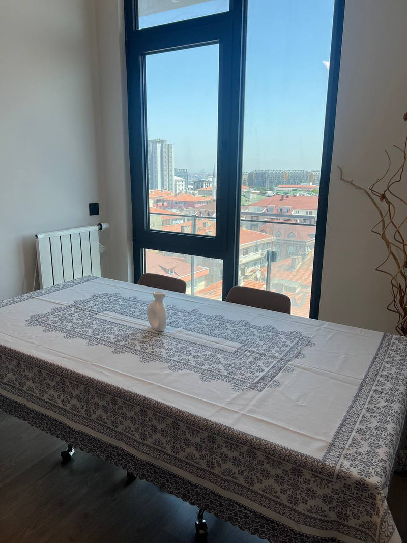 Nappe en tissu polyester imprimé à motifs kilim (140 × 180 cm)