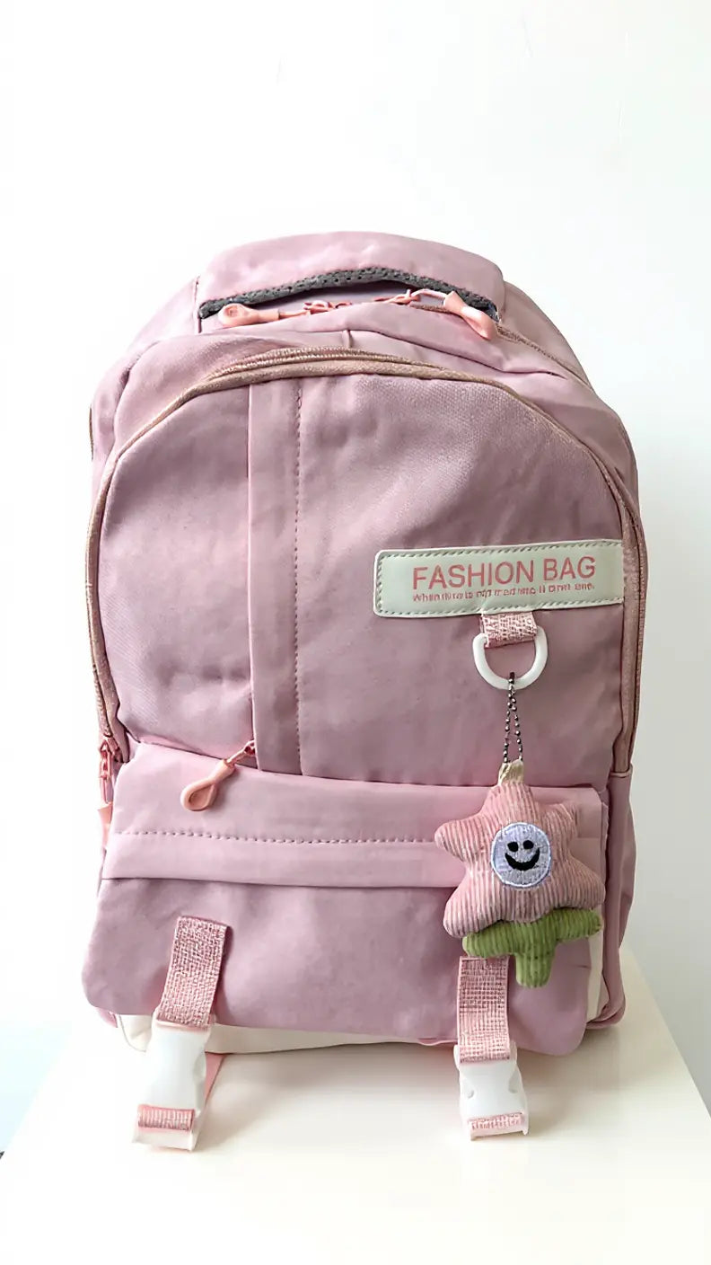 Sac à dos scolaire casual – Couleurs variées & petit accessoire tendance !