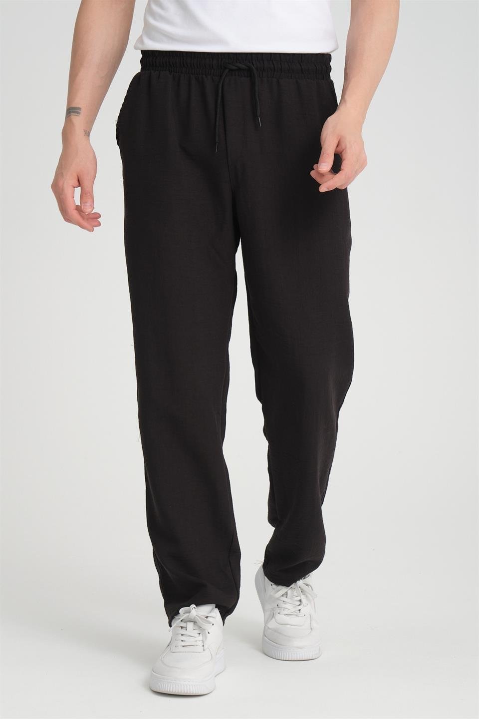 <tc>Pantalon en tissu aerobin à coupe baggy.</tc>