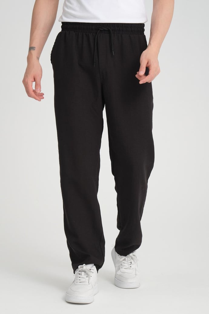 <tc>Pantalon baggy en tissu aerobin.</tc>