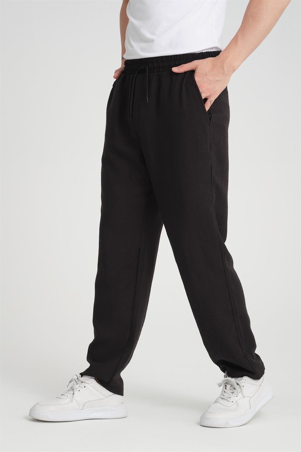 <tc>Pantalon en tissu aerobin à coupe baggy.</tc>