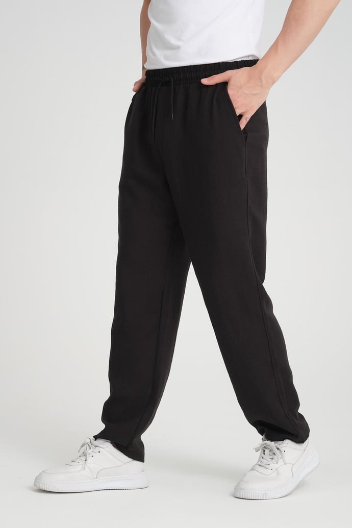 <tc>Pantalon baggy en tissu aerobin.</tc>