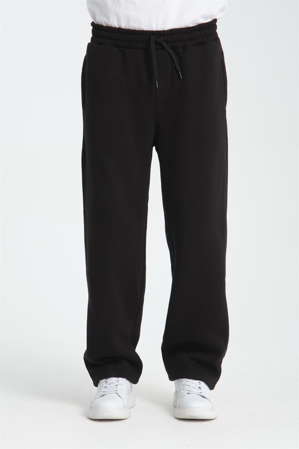 <tc>pantalon de survêtement pour homme en trois fils, coupe baggy avec intérieur en polaire.</tc>