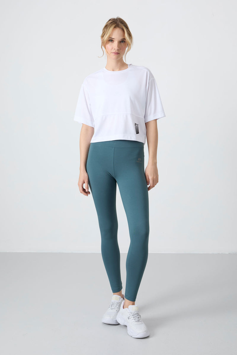 T-shirt performante pour femme en polyester respirant et flexible