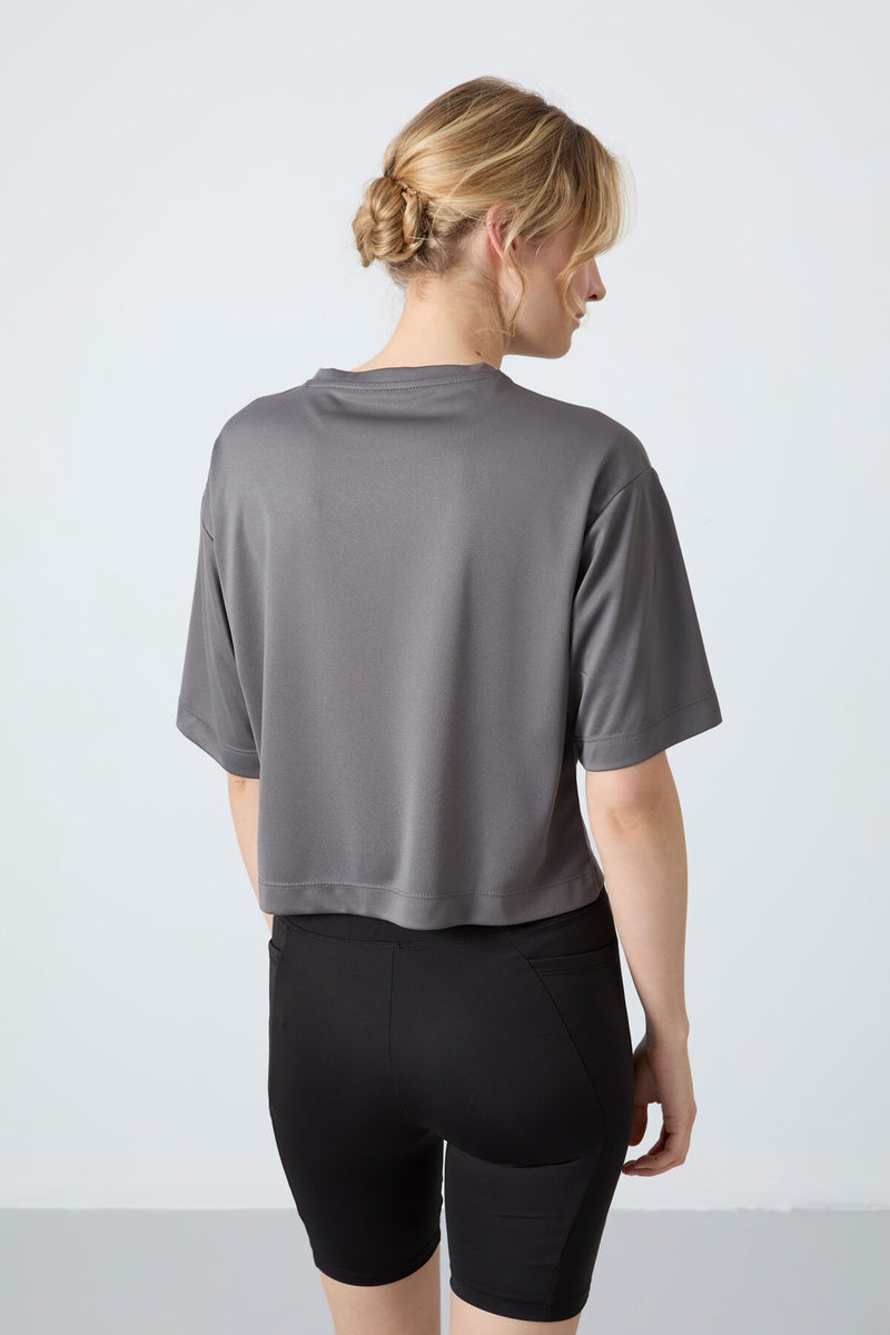 T-shirt performante pour femme en polyester respirant et flexible