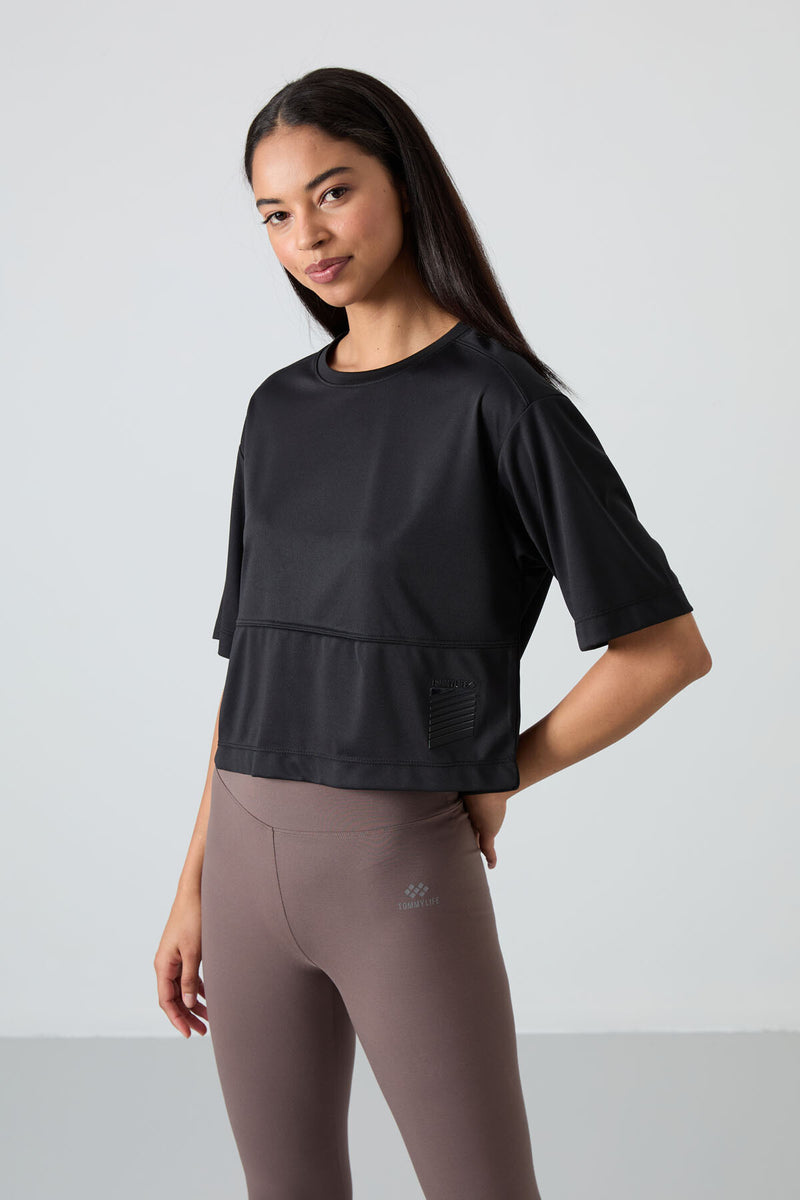 T-shirt performante pour femme en polyester respirant et flexible