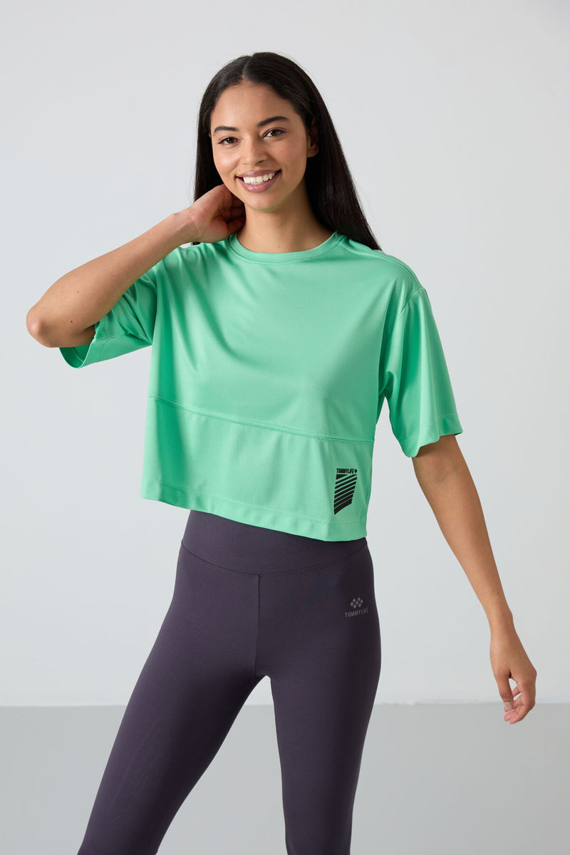 T-shirt performante pour femme en polyester respirant et flexible
