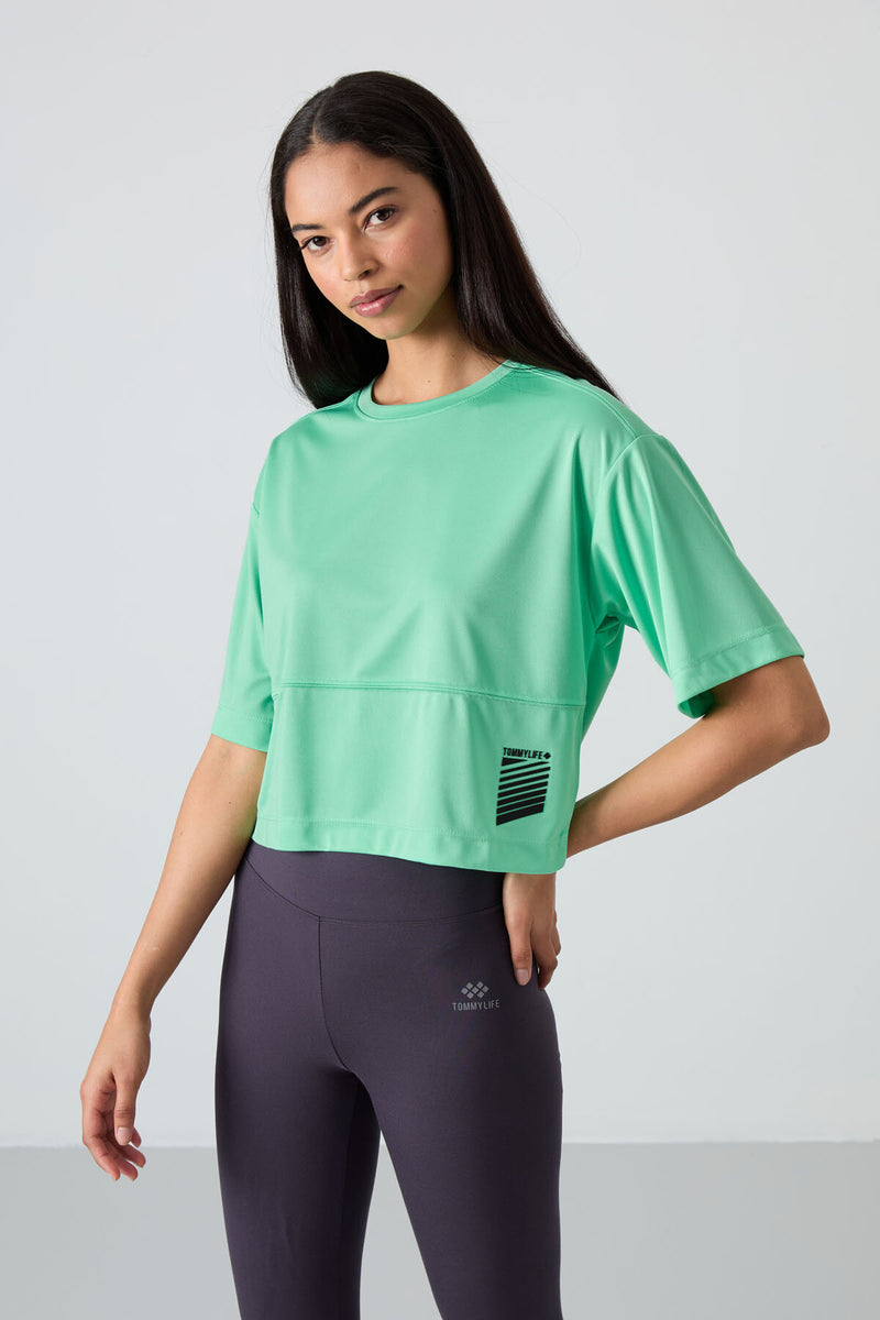 T-shirt performante pour femme en polyester respirant et flexible