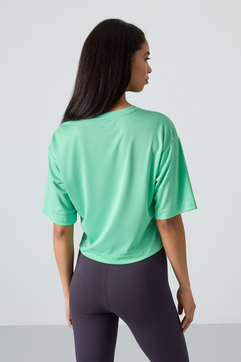T-shirt performante pour femme en polyester respirant et flexible