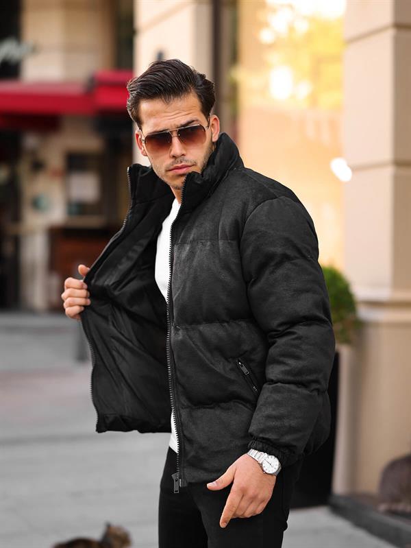 <tc>Manteau en cuir à effet craqué.</tc>