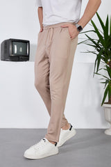 <tc>Pantalon pour homme léger et respirant en tissu diagonal avec taille élastique.</tc>