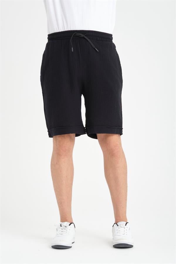 <tc>Short pour homme en muslin, léger et confortable, avec double jambe.</tc>