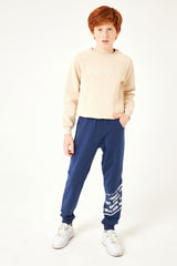 <tc>Pantalon de jogging garçon avec détails d'impression "Never Look"</tc>