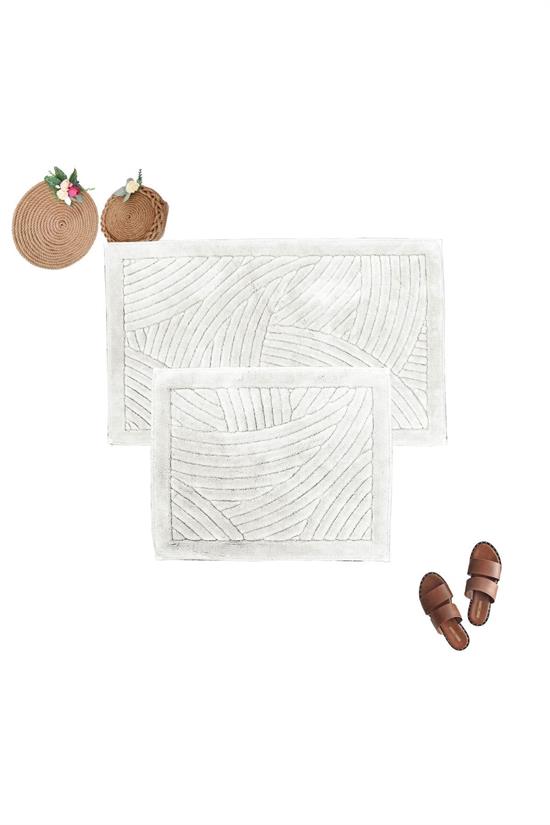 <tc>"Ensemble de 2 tapis de bain à motif géométrique, en 100% coton naturel, comprenant un tapis pour la baignoire et un tapis pour la cuvette de toilettes."</tc>