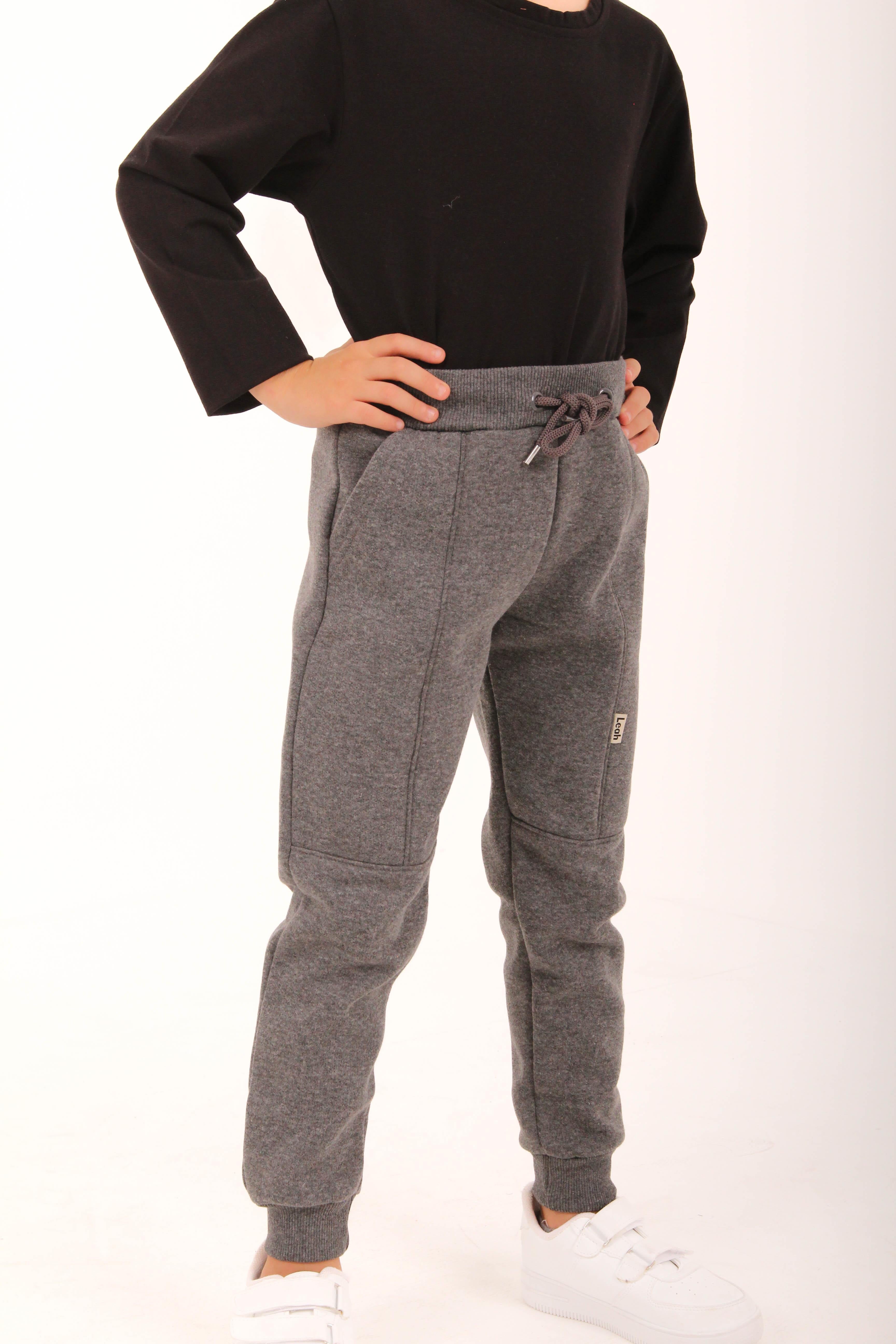 <tc>Pantalon de survêtement unisexe pour enfant avec poches et coupe jogger épaisse</tc>