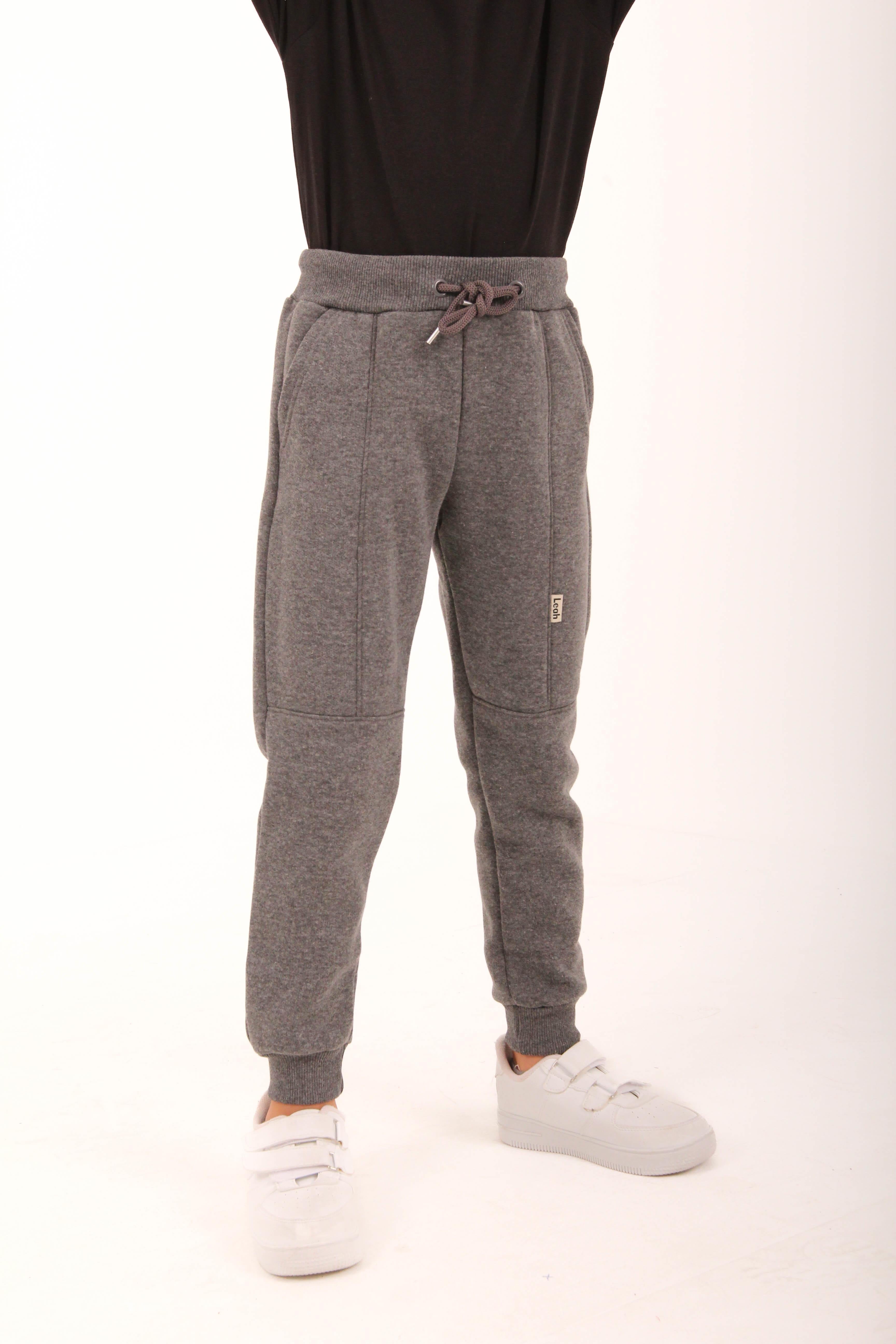 <tc>Pantalon de survêtement unisexe pour enfant avec poches et coupe jogger épaisse</tc>