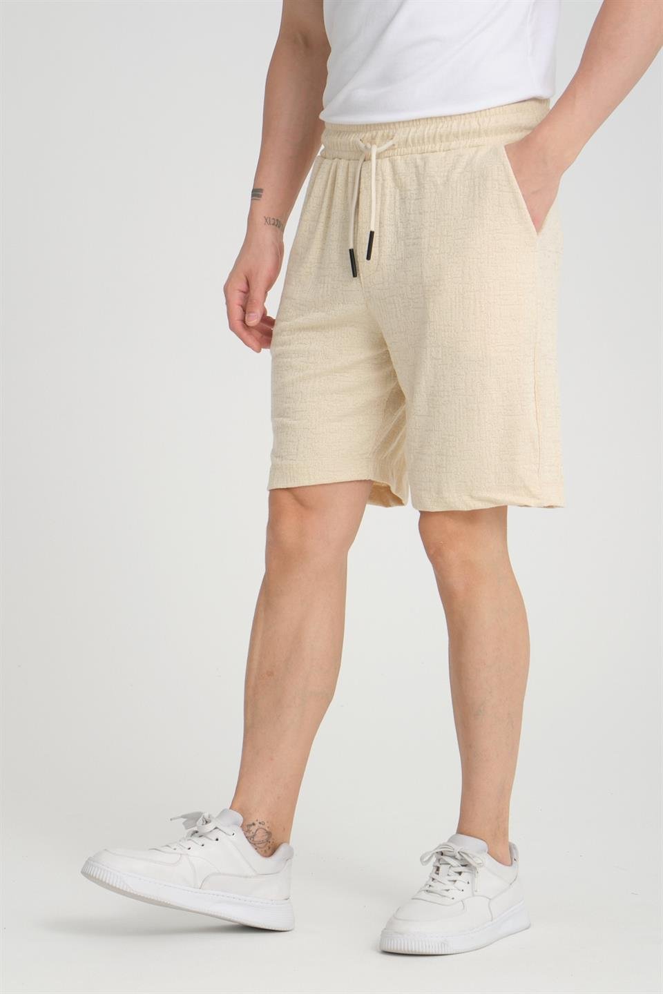 <tc>Short en tricot à motifs avec élasthanne et taille élastique.</tc>