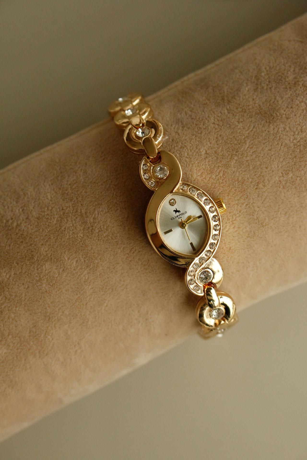 <tc>Montre pour femme Nora Gold avec détails en pierres</tc>